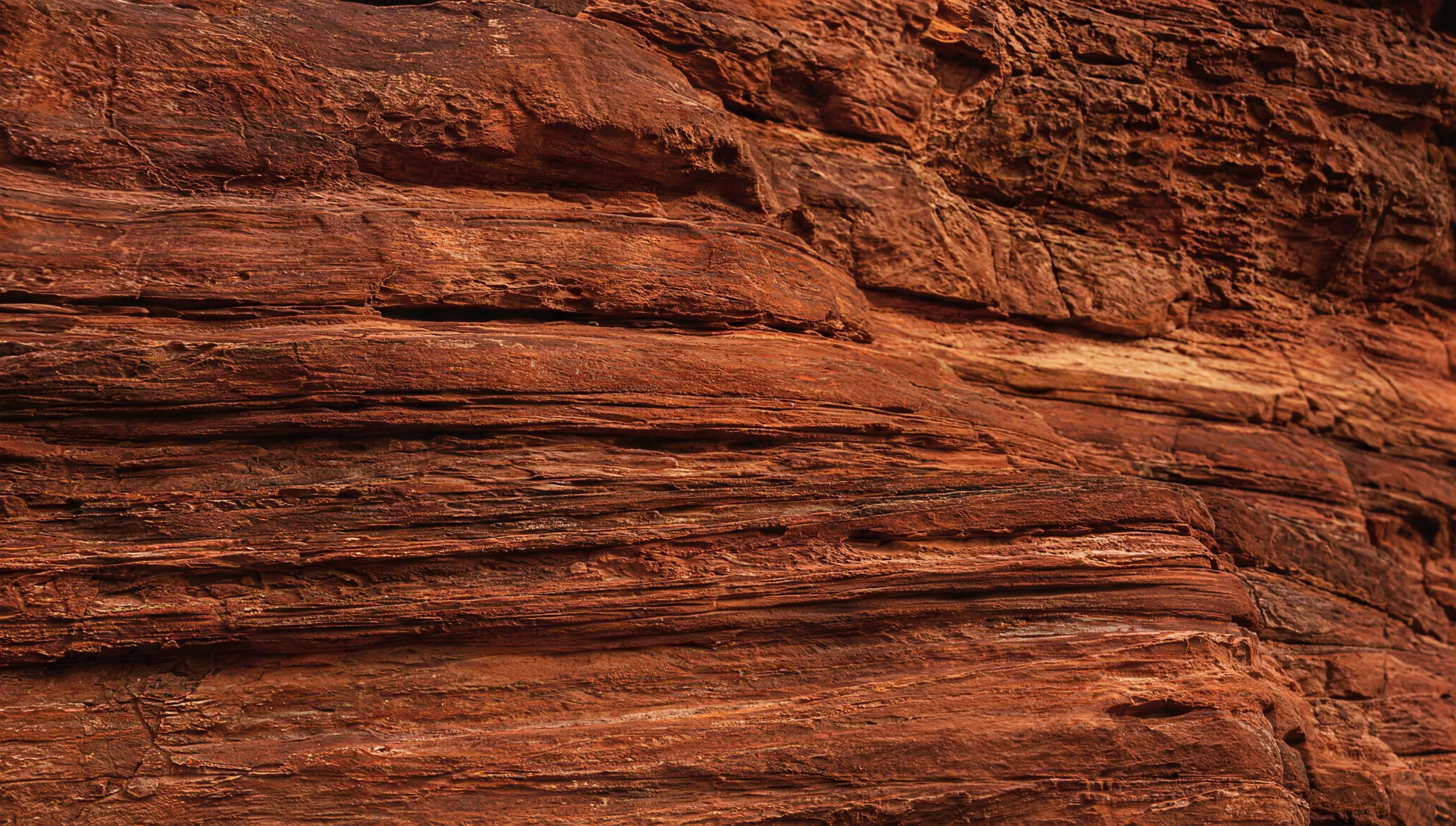 Layers of red sandstone in warm evening light